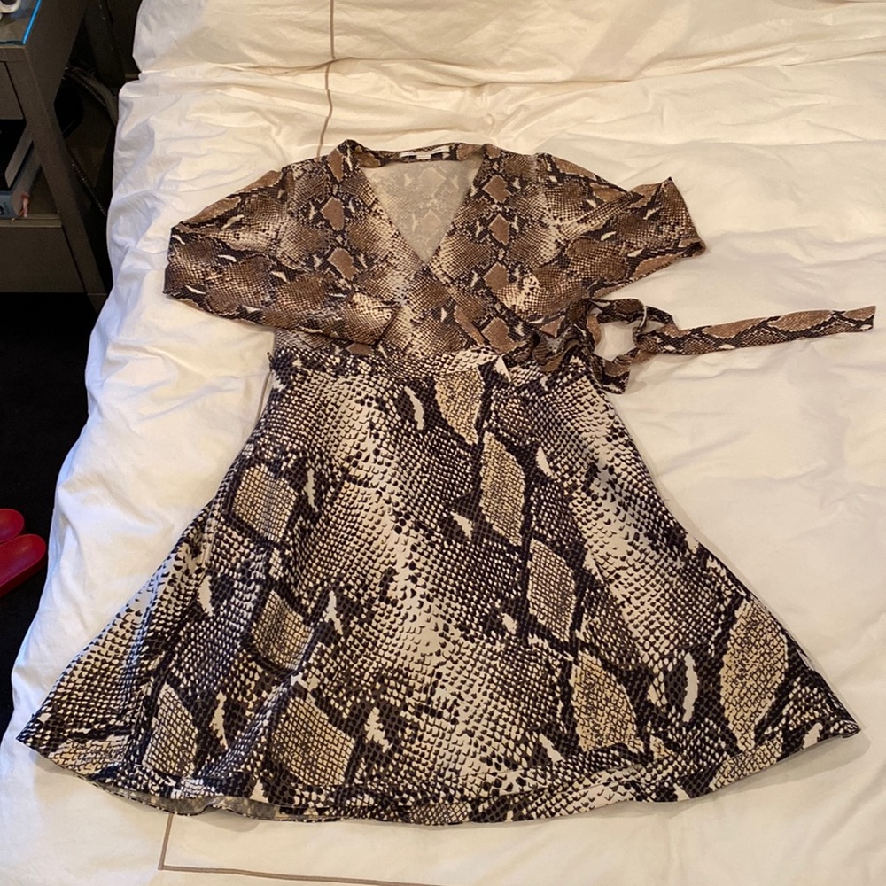 Diane von Furstenberg wrap dress in a snakeskin print. Size 12